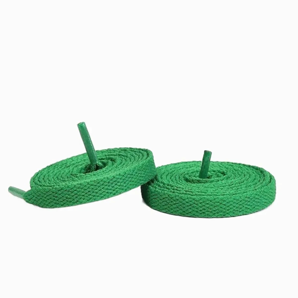 Jordan University Blue sneakers with green shoelaces for shoes, sneakers, and trainers by Kicks Shoelaces.