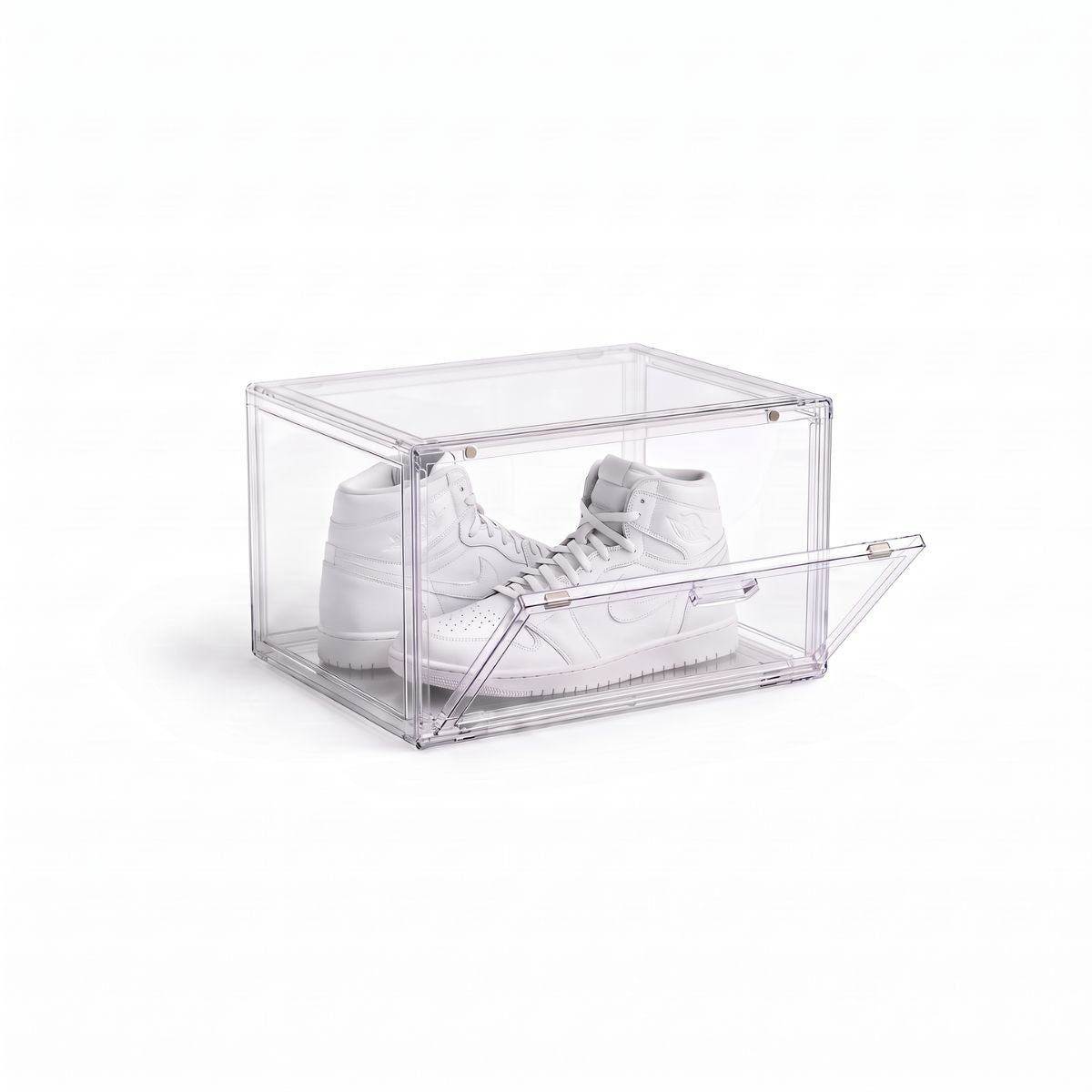 Clear shoe display box with magnetic drop-down door holding a pair of white high-top sneakers