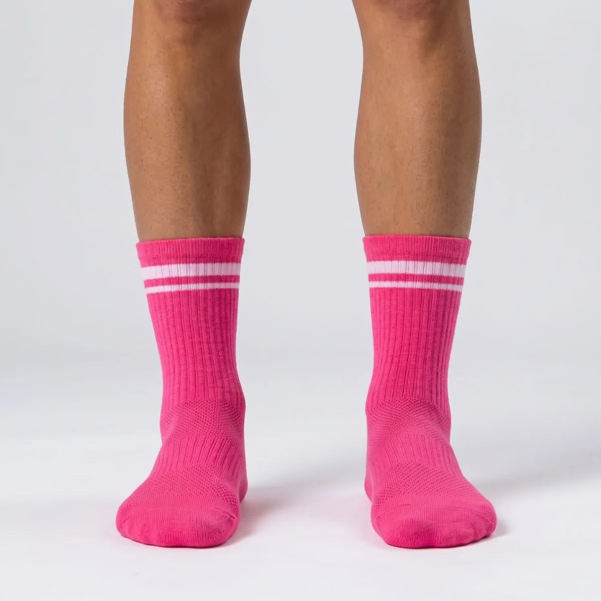 Hot pink athletic crew socks with secure supportive fit by Kicks Shoelaces