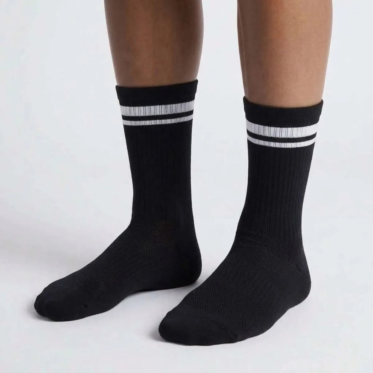 Black athletic crew socks with arch support and cushioning by Kicks Shoelaces