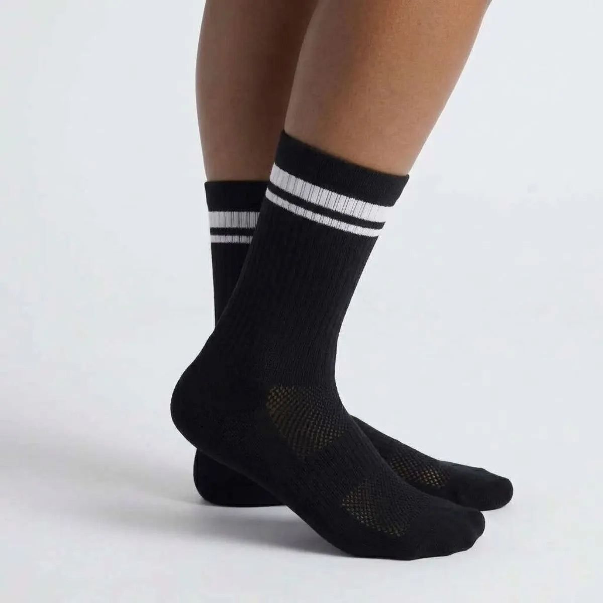 Black sports socks for running, football, and training by Kicks Shoelaces