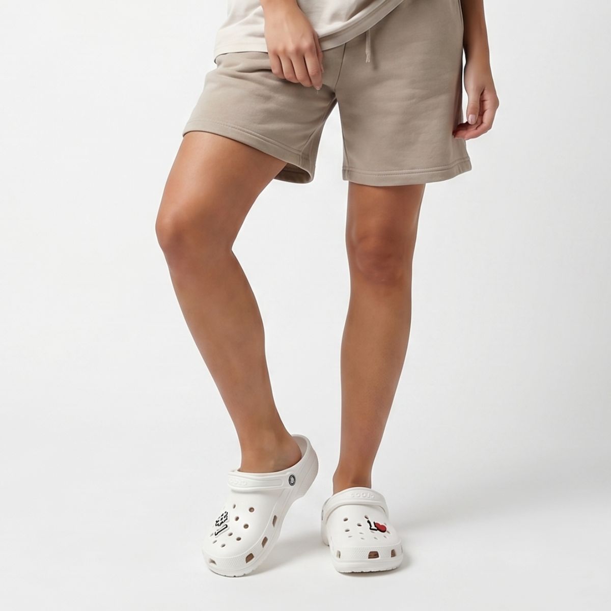 Casual streetwear styling with Crocs and varsity number charms by Kicks Shoelaces