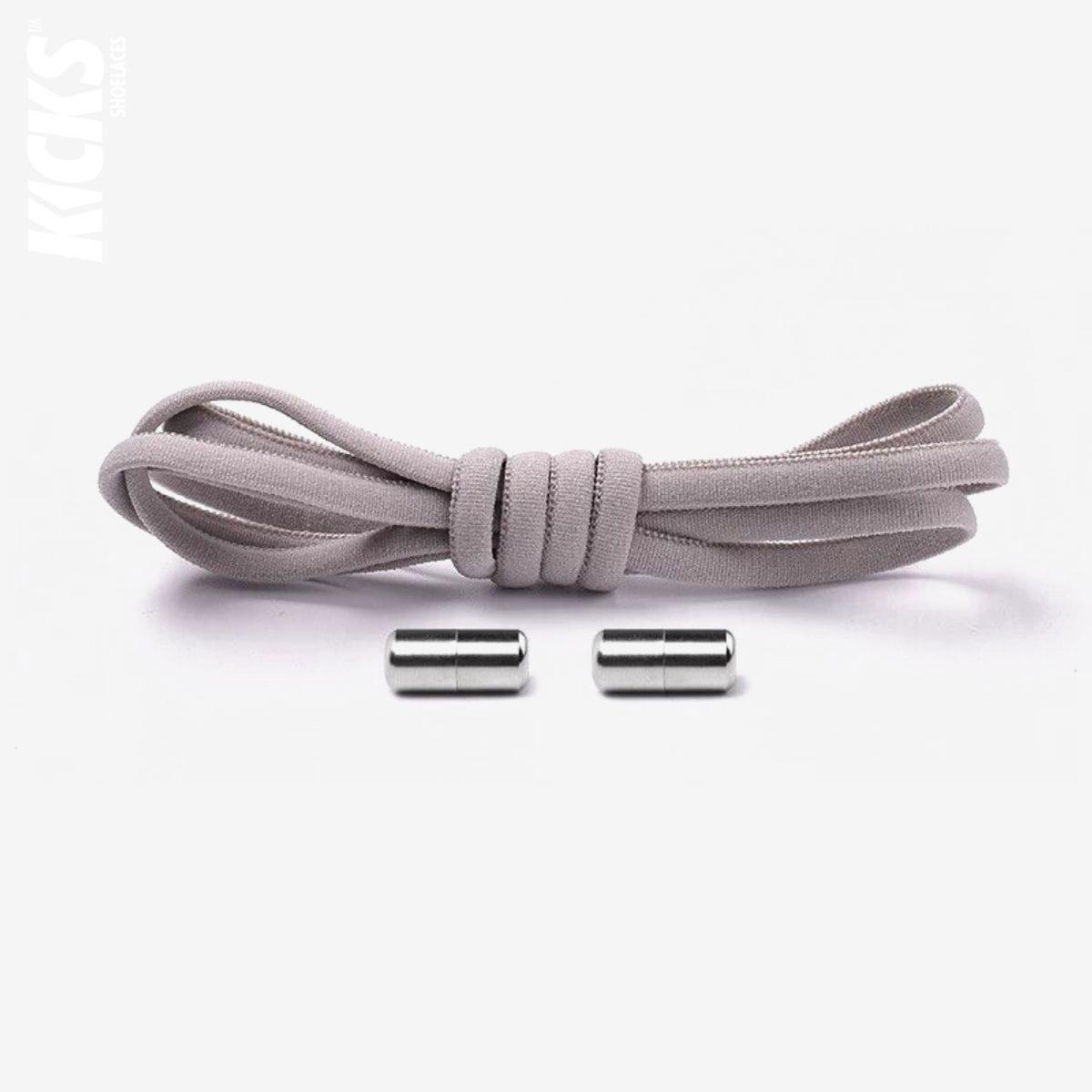 Grey oval no-tie elastic shoelaces with capsule lock system by Kicks Shoelaces