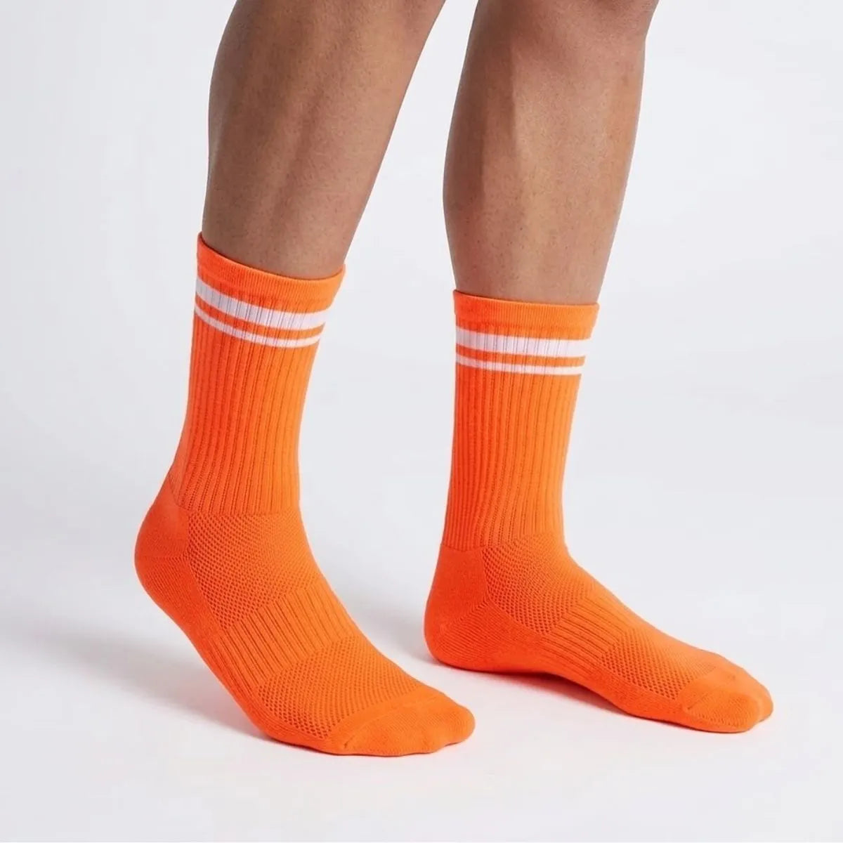 Hyper orange moisture-wicking athletic crew socks by Kicks Shoelaces