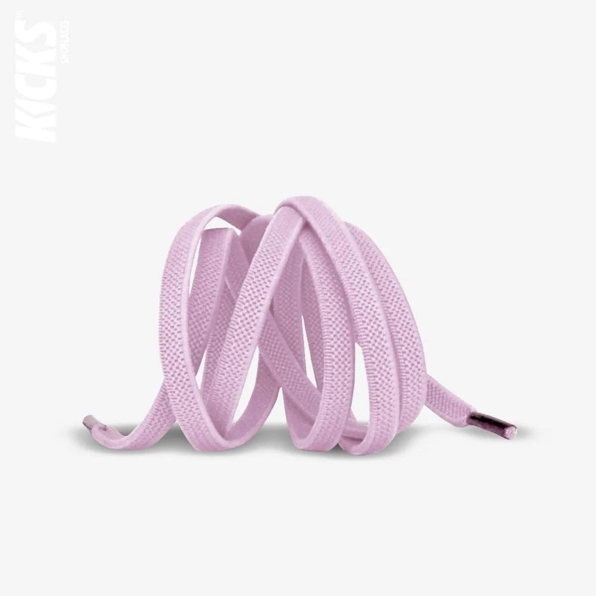 light pink elastic no-tie shoelaces with a buckle lock system installed on sneakers for a secure slip-on fit without tying the laces, by Kicks Shoelaces.