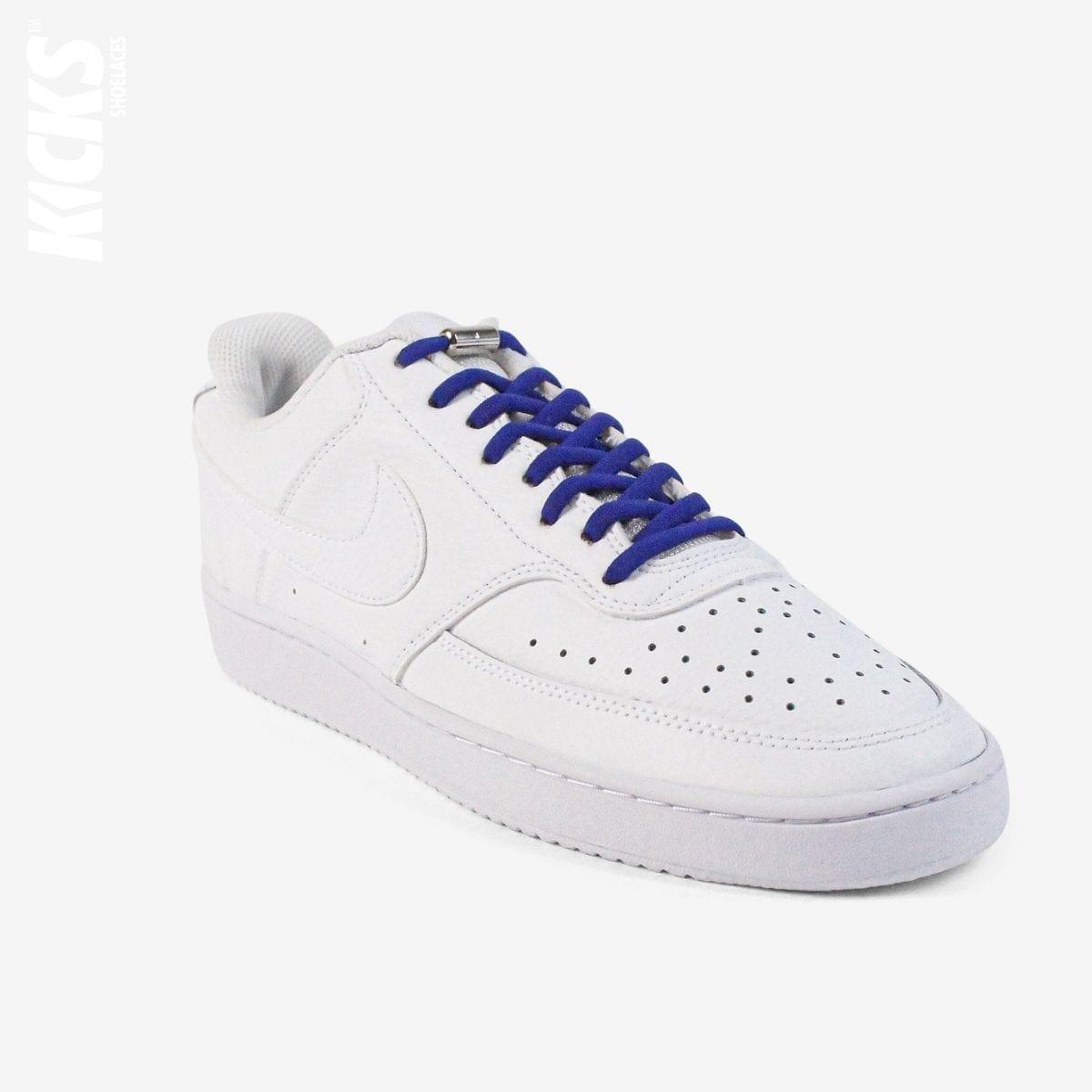 Royal blue oval no-tie elastic shoelaces installed on white sneakers by Kicks Shoelaces