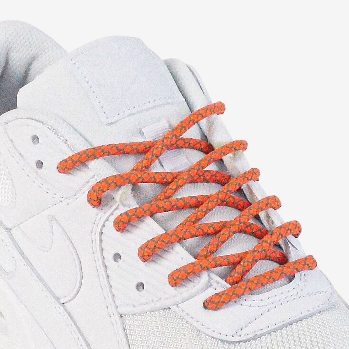 custom-color-shoelaces-on-white-sneakers-with-reflective-orange-laces