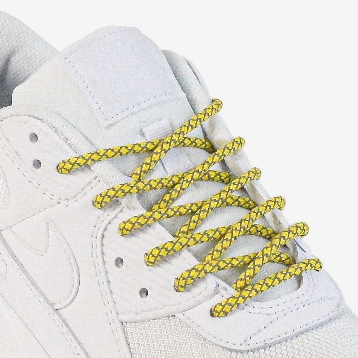 custom-color-shoelaces-on-white-sneakers-with-reflective-yellow-laces