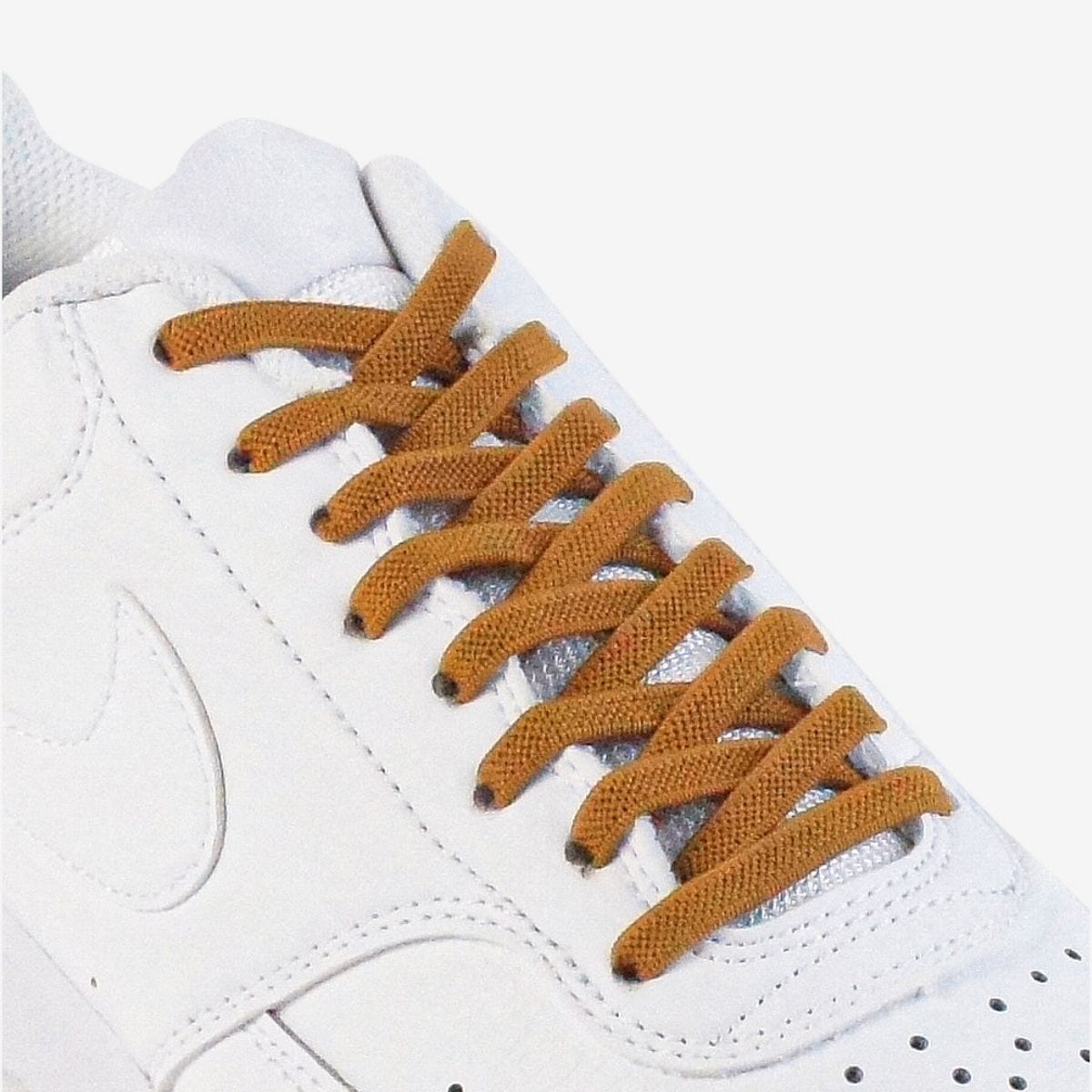 kids-no-tie-shoelaces-with-brown-laces-on-nike-white-sneakers-by-kicks-shoelaces