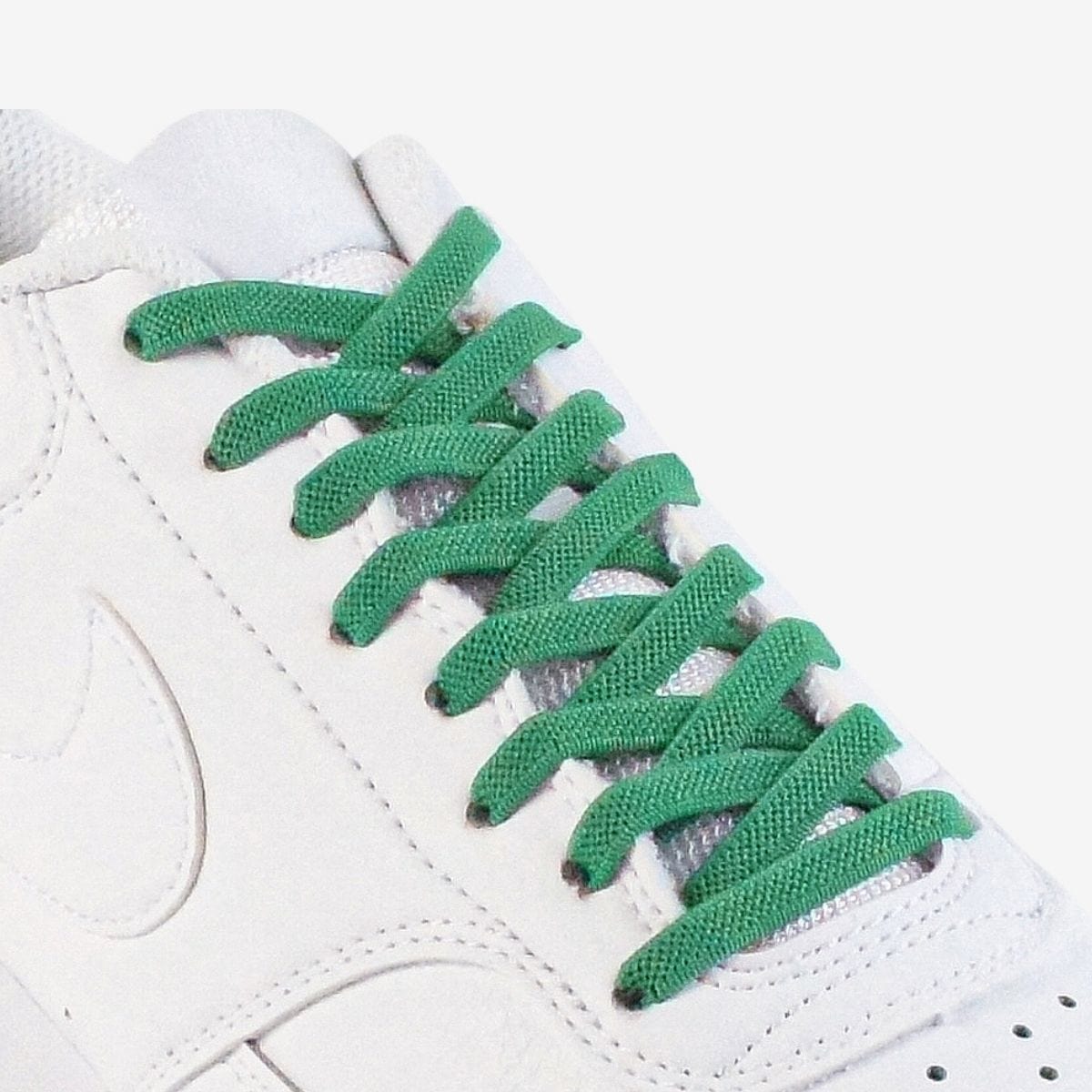 kids-no-tie-shoelaces-with-green-laces-on-nike-white-sneakers-by-kicks-shoelaces